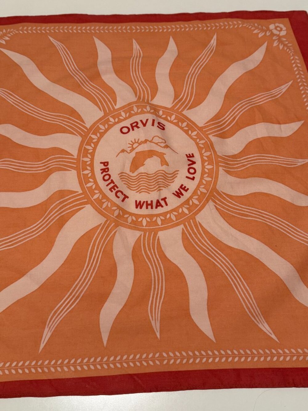Orvis Statement Bandana | Protect What We Love | Trout Sunburst 20x20